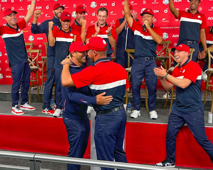 Brooks Koepka and Bryson DeChambeau hug at out at the Ryder Cup.